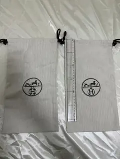 HERMES 保存袋 巾着袋 2枚セット エルメス ヘリボーン - メルカリ