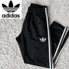 アディダス トラックパンツ ジャージパンツ ファイヤーバードロゴ刺繍 黒ブラック