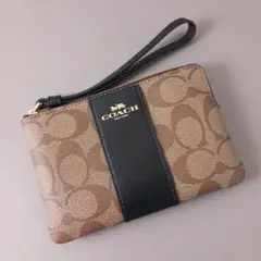 261/未使用 COACHコーチ コーナージップリストレットポーチ シグネチャーのサムネイル