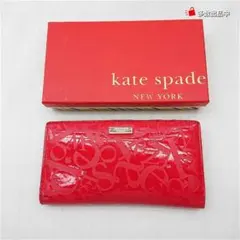 ケイト・スペード エンボスロゴ レザー長財布 レッド系 レディース