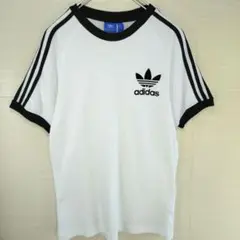 アディダスオリジナルス　リンガーTシャツ　フロッキープリント　3ストライプ