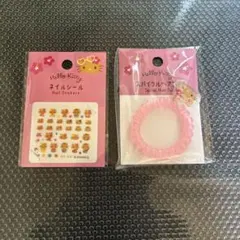 ダイソー　日焼けキティ　ネイルシール　スパイラルへアゴム　２点