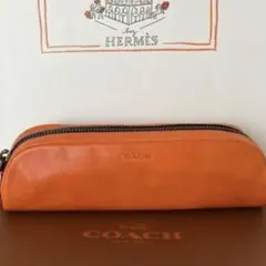 【新品未使用】COACH カーフレザー ペンシルケース　サンバ　オレンジ　箱付き