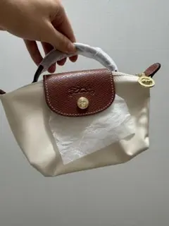 ロンシャン　LONGCHAMP　ルプリアージュ ミニハンド ポーチ　ホワイト　白 ロンシャン LONGCHAMP ルプリアージュ ミニハンド ポーチ ホワイト 白