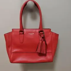 COACH ハンドバッグ レッド タッセル付き - メルカリ