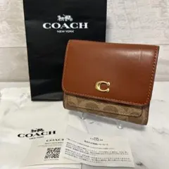 美品　コーチ　ミラ スモール フラップ ウォレット　シグネチャー キャンバス