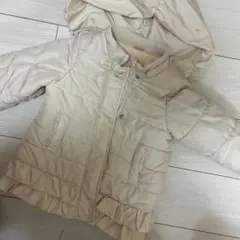 アイボリー フリル裾付きダウンコート