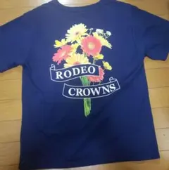 最終値下げ RODEO CROWNS バックフラワープリント Tシャツのサムネイル