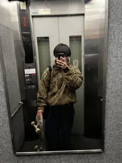 REALツリーハーフジップジャケット
