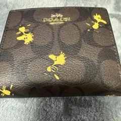 COACH 二つ折り財布 シグネチャー ウッドストック - メルカリ