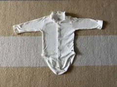ホワイト フリル付き長袖ボディスーツ