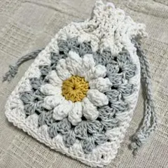 ハンドメイド ひまわりモチーフ 巾着袋 かぎ針編み - メルカリ