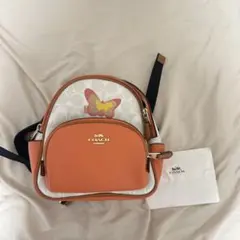 COACH シグネチャー バタフライ ミニリュックのサムネイル