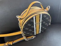 ユリカ様専用　GUESS 円形ショルダーバッグ 黒/黄色/白