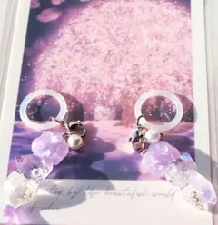 レジンキーホルダー　猫 紫 透明　アンブレラマーカー　桜入り肉球　ハンドメイド