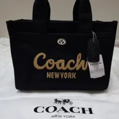 ま*ま様 COACHコーチリボンカーゴトートバッグ大容量３４cmブラック COACHコーチ大容量34cmリボン柄カーゴトートバッグ - メルカリ
