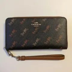 COACH スヌーピー柄 ブラウンポーチ - メルカリ
