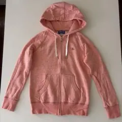 お値下げCarhartt サーモンピンク ジップアップパーカー - メルカリ