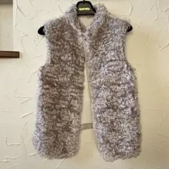 コムサ KTフワフワファー風のノースリーブベスト　11号