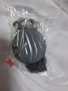 黒の円形キーホルダー
