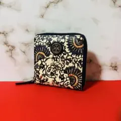 0034 TORY BURCH 総柄 ラウンドファスナー TTロゴ 折り財布