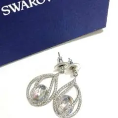 美品】SWAROVSKI スワロフスキー クリスタルブルー ピアス 8の字 | Mercari
