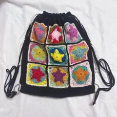 【ハンドメイド・完成品】ナップサック　リュック　バッグ　メッシュ　星　編み物　黒