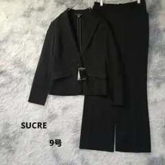 【新品タグ付き】SUCRE ブラック パンツスーツ 洗える　春夏　９号