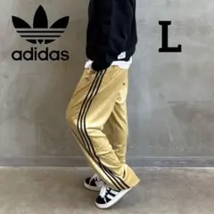 新品 adidas Originals ベロアトラックパンツ ベージュ ゴールド