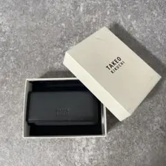 新品未使用　タケオキクチ　キーケース　4連　カーフ　レザー　グレー　ロゴ型押しのサムネイル