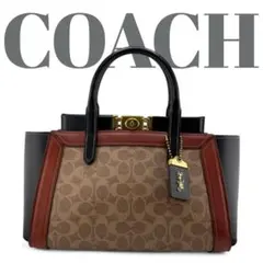 【美品】COACHトループ 2wa y バッグ バイカラー 白黒 ターンロック 美品】COACHトループ 2wa y バッグ バイカラー 白黒 ターン