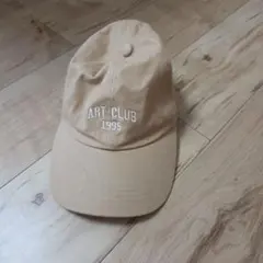 GU ART CLUB 1995 ロゴ キャップ ベージュ