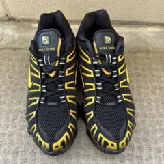 Nike Shox TL “Black/University Gold”