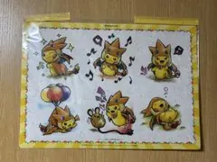 ポケモンセンター　メガリザードンポンチョ　ピカチュウ　クリアポスター
