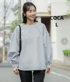 coca パリフワバックリボンAラインブラウス 長袖 ブルー L