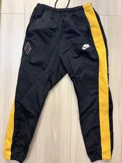 NIKE NSW ナイロンパンツ ブラック イエロー メンズ Sのサムネイル