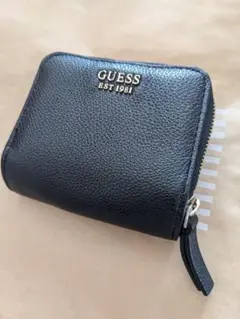バ*ナ様 GUESSゲス　黒ブラック　二つ折り財布　ロゴプリント　シンプルのサムネイル