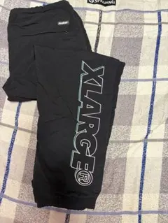 XLARGE ブラック ロゴ入りナイロンパンツのサムネイル
