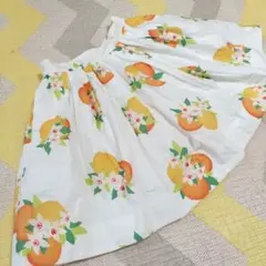 オレンジと花のプリントスカートのサムネイル