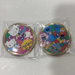 USJ 25周年 缶バッジ 2種セット　ハローキティ　セサミストリート