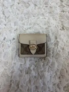 COACH 二つ折り財布 シグネチャー ベージュのサムネイル