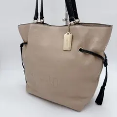 COACH コーチ　アンディ　トートバッグ　巾着　ベージュ　エンボス