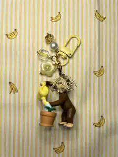 おさる　めじるしアクセサリー　ジョージの一日フィギュア