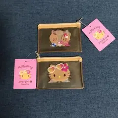 100均　日焼けキティ　フラットポーチ　2個セット