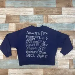 ネイビー グラフィックプリント トレーナー