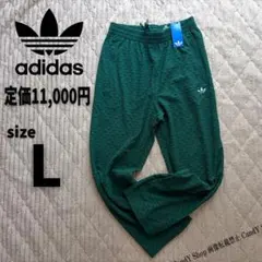 アディダスオリジナルス トラックパンツ モノグラム 総柄 緑 グリーン Lのサムネイル
