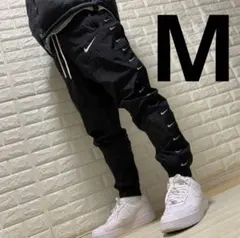 メンズM ブラック ウーブン パンツ ライン ナイロン スウッシュ NIKE