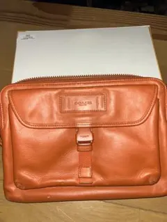 COACH オレンジ レザー バッグ