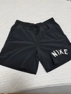 Nikeドライフィットアンリミテッド スウッシュパンツ ブ《XL》　一度着用のサムネイル