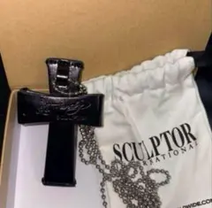 SCULPTOR クロスストラップレザーウォレット SCULPTOR（スカルプター）の「Cross Strap Wallet/クロス